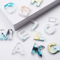 JUSTDOLIFE - Moldes de silicona para alfabeto de resina y silicona, diseño de letras, número de moldes de silicona para hacer llavero/número de casa - Arteztik
